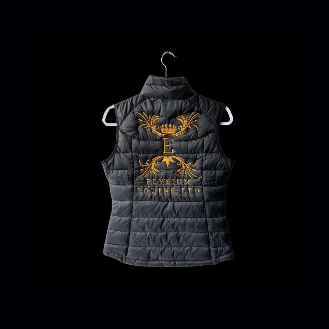 Black puffer vest with the name and logo of Elysium Equine LTD. Indicated that Zone West can do customized vests.